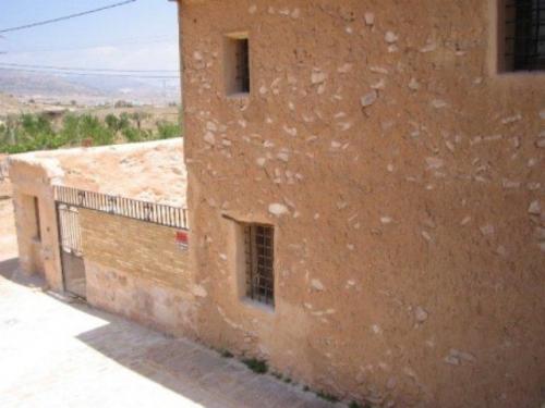 Casa de campo semi-cueva con bonitas vistas a zonas rurales.