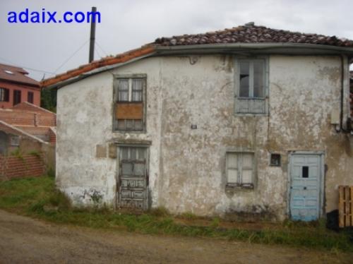 CASA ADOSADA CON CON HUERTO EL EL CUAL HAY EDIFICADA