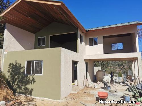 Vendo casa a pocos metros de Hobbitenango para inversión