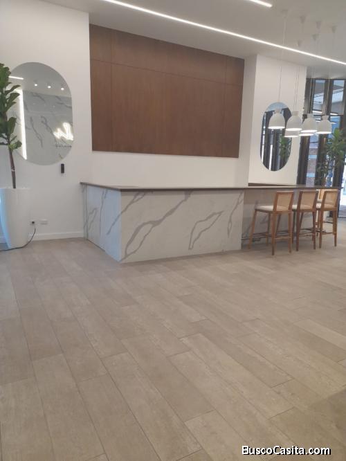 RENTO LOCAL COMERCIAL EN ZONA 10, EDIFICIO AIRIALI