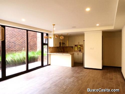 Apartameno con jardin en venta zona 10.