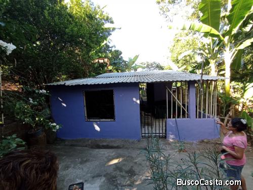 Terreno con casa