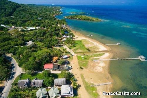 Vendo terreno a orilla de calle principal/ROATAN