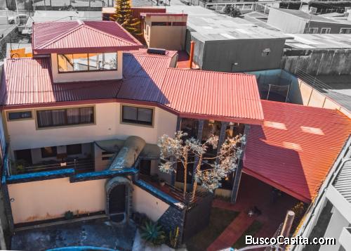 OPORTUNIDAD - Se vende Casa Moderna en Residencial Privado - El Carmen de Guadalupe, San José.