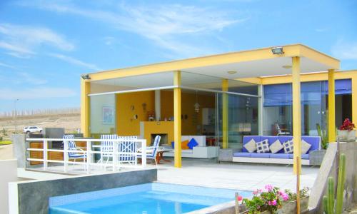 VENTA DE LINDA CASA CON VISTA AL MAR Y AMPLIA TERRAZA EN CONDOMINIO CLUB HOUSE LAS PALMERAS