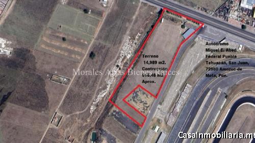 Terreno plano con uso comercial y acceso a pie de carretera en Amozoc, Puebla