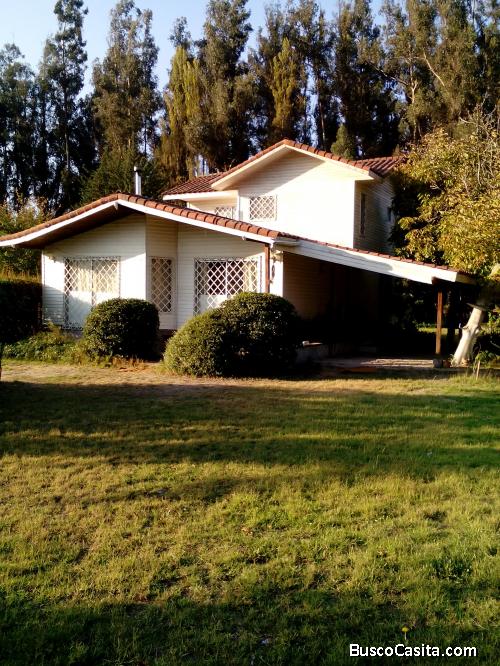 vendo parcela con casa