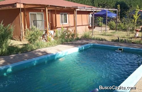 VENTA PARCELA DE AGRADO CON CASAS Y CABAÑAS