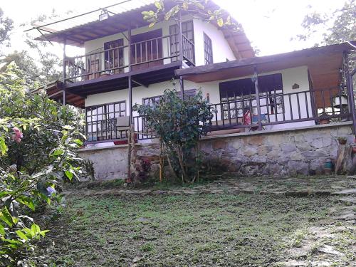 Bonita finca, con una casa confortable. Clima muy agradable