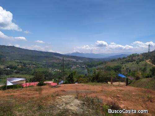 Lote con casa en obra negra