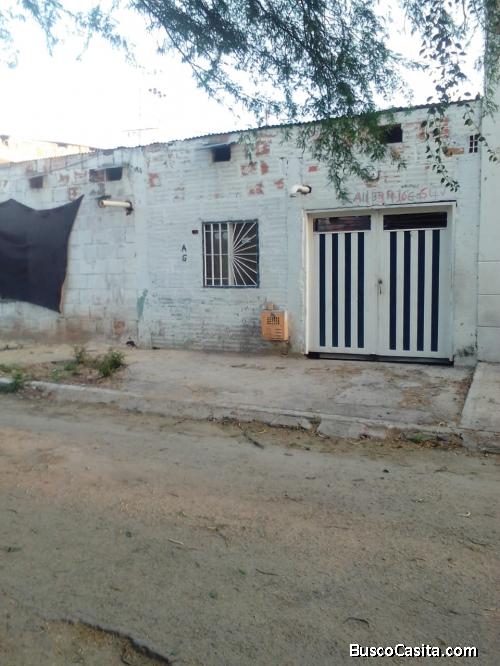 Casa lote en obra negra