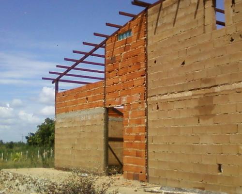 VENDO TERRENO CON CASA EN CONSTRUCCION CON TERRENO PRIVADO