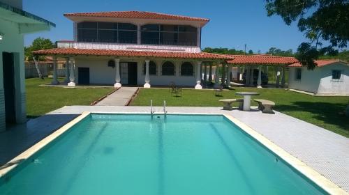 CAMBIO O VENDO CASA EN HIGUEROTE