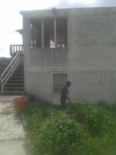 Terreno con casa en Higuerote