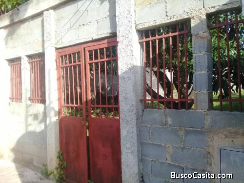 terreno con construccion iniciada