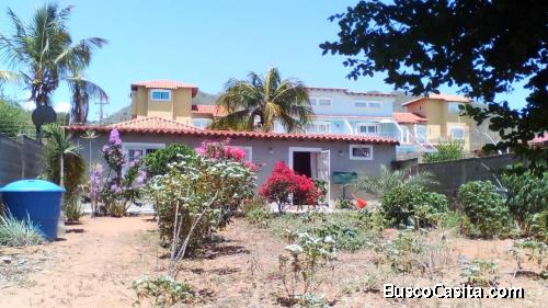 Terreno con vista al mar, casa en construccion