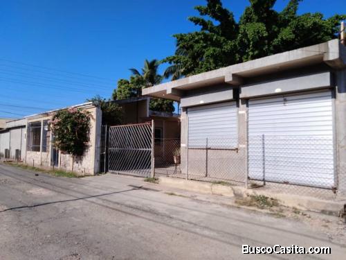 VENDO PROPIEDAD,TERRENO CON CASA Y LOCAL COMERCIAL