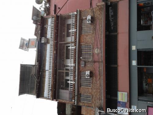 Edificio con fondo de Comercio 