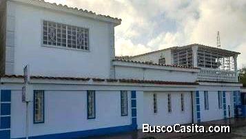 CASA CON 5 APARTAMENTOS 