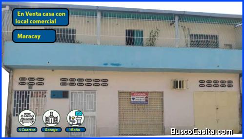 Venta de casa de dos niveles con local comercial