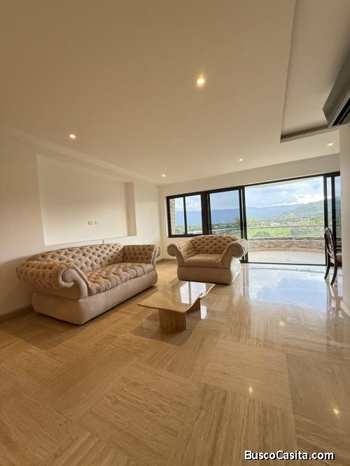 Elegancia, amplitud y vistas incomparables en piso bajo