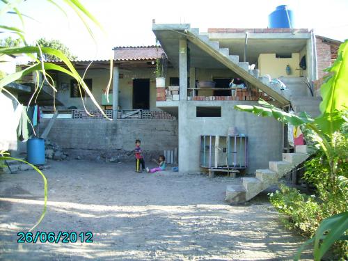 Vendo un lote con medias aguas en Catamayo.
