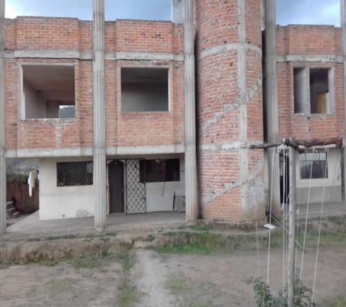 HERMOSO TERRENO Y CASA EN CAYAMBE