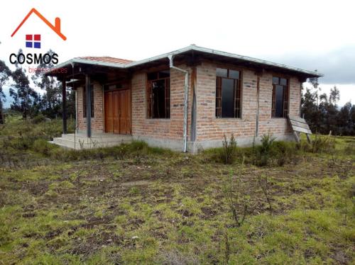 Vendo terreno con casa junto al peaje de San Roque