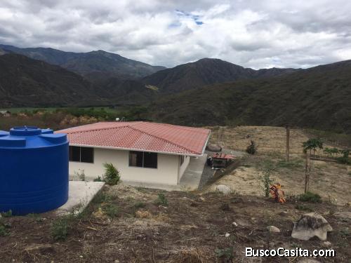 Terreno con casa 