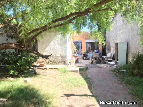 Terreno con Mejoras