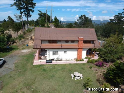 ILLA CON SU FINCA EN JARABACOA