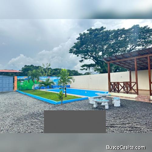 TERRENO DE 6 TAREAS CON DOS CASAS DE VENTA EN BONAO