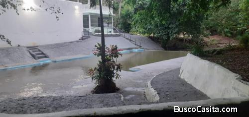 TERRENO DE 10 TAREAS CON RÍO DE VENTA EN BONAO