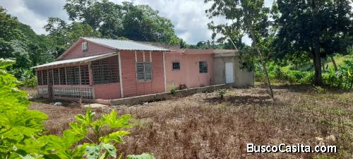 Vendo Finca de 15 Tareas ORILLA CARRETERA en El Cacique de Monte Plata, con CASA + SIEMBRA  + RIO