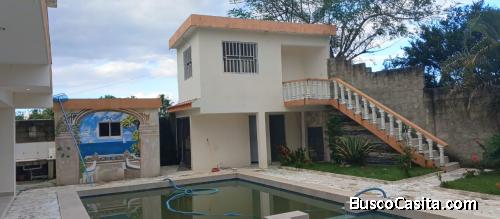 TERRENO DE 1,500 MTR CON DOS APARTAMENTOS DE VENTA EN BONAO